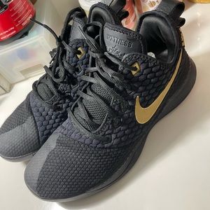 Nike basketball gold and black men witness III